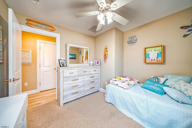 802 Coolidge Rd Unit 2, Ocean City, NJ 08226 - bedroom with light carpet, baseboards, and ceiling fan