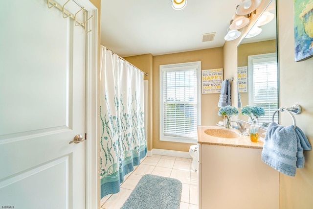 802 Coolidge Rd Unit 2, Ocean City, NJ 08226 - full bath featuring tile patterned floors, healthy amount of natural light, toilet, and vanity