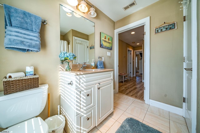802 Coolidge Rd Unit 2, Ocean City, NJ 08226 - full bathroom featuring toilet, baseboards, vanity, and tile patterned floors