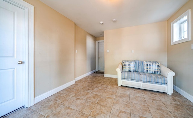 802 Coolidge Rd Unit 2, Ocean City, NJ 08226 - living area featuring tile patterned flooring and baseboards