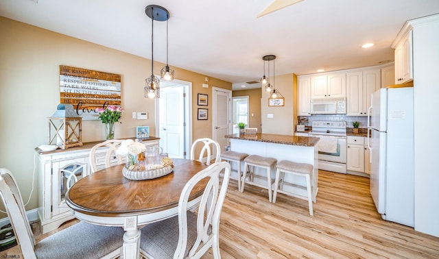 802 Coolidge Rd Unit 2, Ocean City, NJ 08226 - dining space featuring light wood-style flooring and recessed lighting
