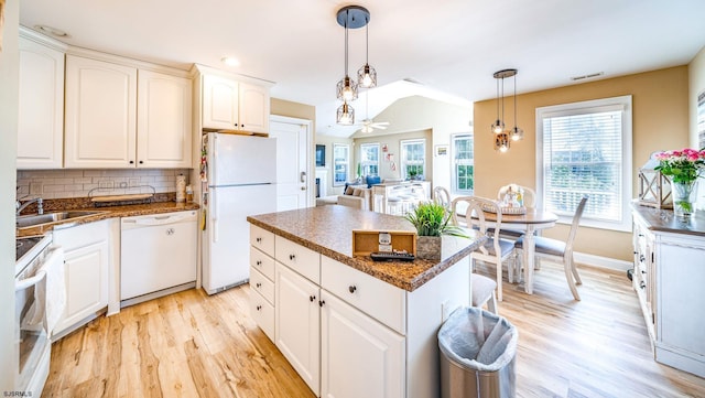 802 Coolidge Rd Unit 2, Ocean City, NJ 08226 - kitchen featuring white appliances, light wood-style floors, a sink, tasteful backsplash, and a ceiling fan