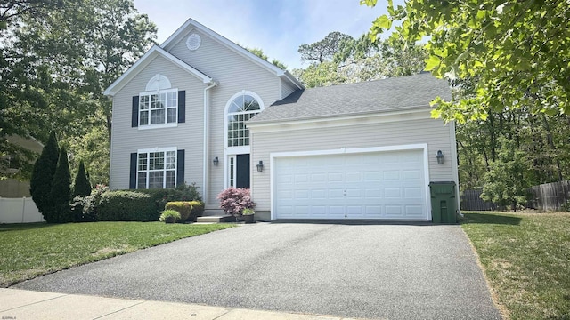 223 Churchill Dr, Egg Harbor Township, NJ 08234 - view of front facade featuring driveway and an attached garage