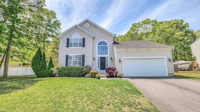 223 Churchill Dr, Egg Harbor Township, NJ 08234 - traditional-style home featuring asphalt driveway and a garage