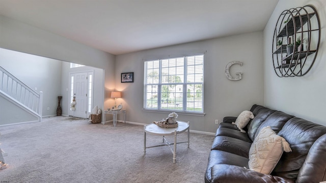 223 Churchill Dr, Egg Harbor Township, NJ 08234 - living area with stairs, carpet floors, and baseboards
