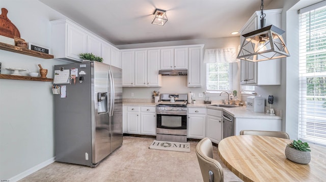 223 Churchill Dr, Egg Harbor Township, NJ 08234 - kitchen with stainless steel appliances, under cabinet range hood, a sink, and plenty of natural light