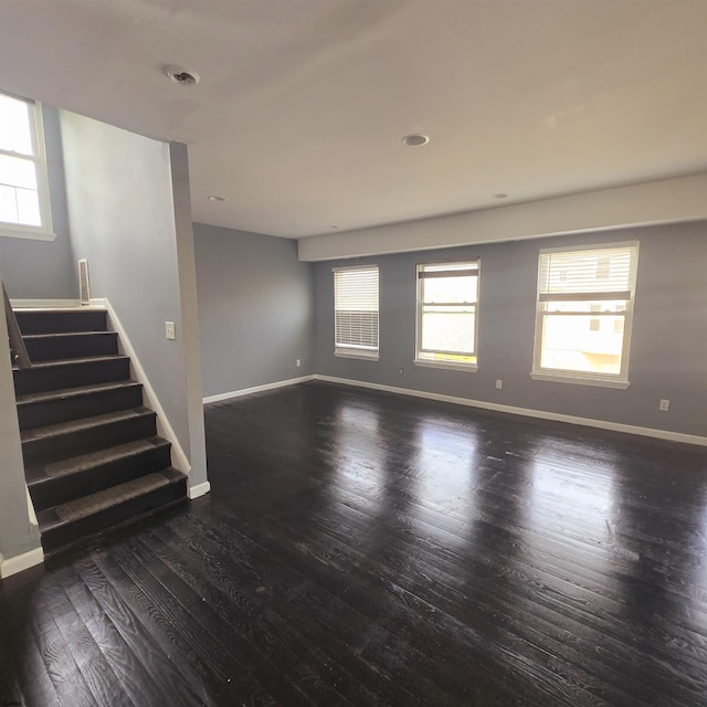 206 N S Carolina Ave, Atlantic City, NJ 08401 - unfurnished living room featuring stairway, wood finished floors, and baseboards