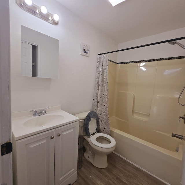 206 N S Carolina Ave, Atlantic City, NJ 08401 - bathroom with wood finished floors, toilet, shower / bath combination with curtain, and vanity