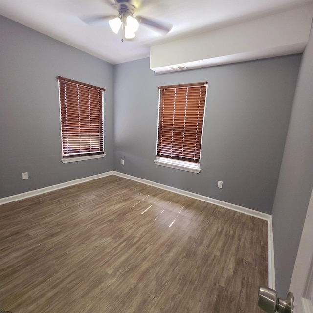 206 N S Carolina Ave, Atlantic City, NJ 08401 - empty room featuring dark wood-style floors, a ceiling fan, and baseboards