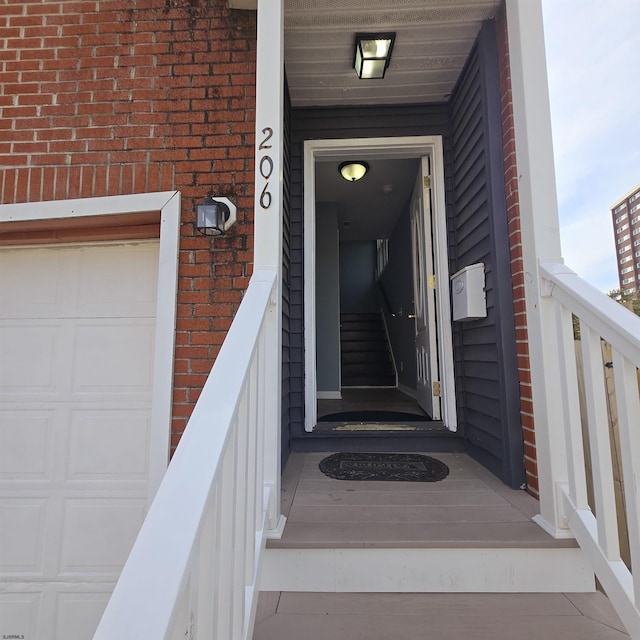206 N S Carolina Ave, Atlantic City, NJ 08401 - entrance to property with a garage and brick siding