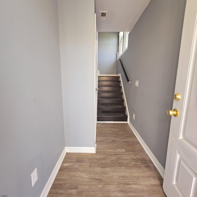 206 N S Carolina Ave, Atlantic City, NJ 08401 - staircase featuring wood finished floors and baseboards