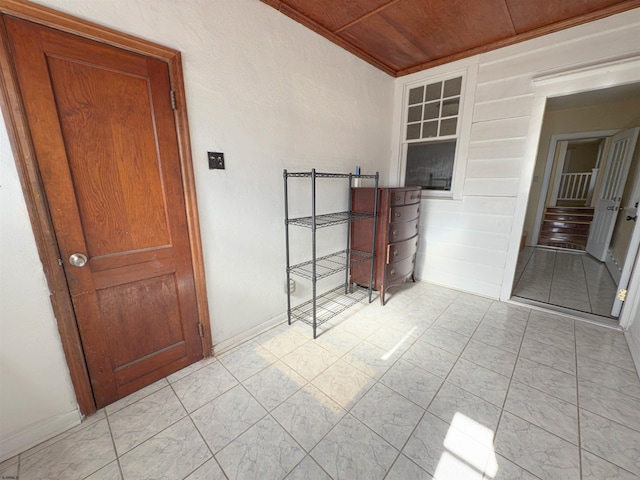 118 N Portland Ave, Ventnor, NJ 08406 - unfurnished room with wooden ceiling, light marble finish flooring, and baseboards