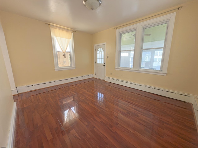 118 N Portland Ave, Ventnor, NJ 08406 - foyer entrance featuring a baseboard heating unit, wood finished floors, and baseboards