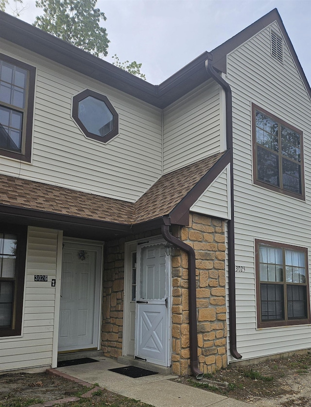 3025 Ivy Bush Ct Unit 3025, Mays Landing, NJ 08330 - view of exterior entry with stone siding and a shingled roof