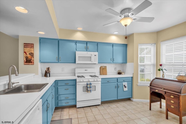 669 E Lake Front Cir Unit 669, Smithville, NJ 08205 - kitchen featuring white appliances, blue cabinetry, a sink, tasteful backsplash, and recessed lighting