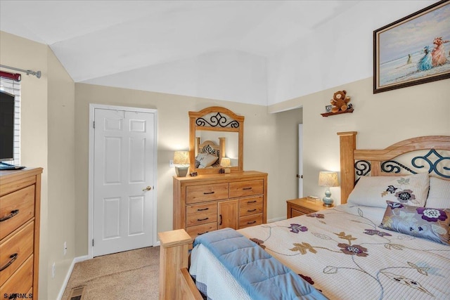 669 E Lake Front Cir Unit 669, Smithville, NJ 08205 - bedroom featuring lofted ceiling, light colored carpet, and baseboards