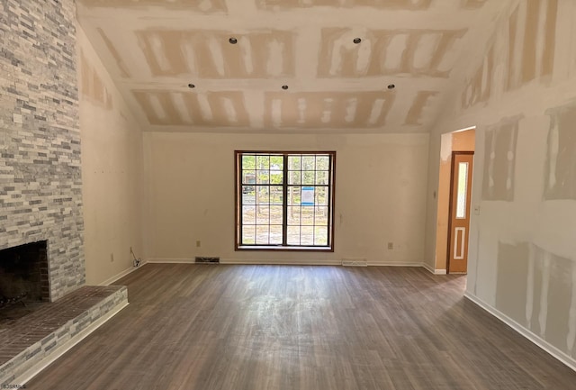 205 Country Ln, Galloway Township, NJ 08205 - unfurnished living room featuring dark wood finished floors, a fireplace, baseboards, and high vaulted ceiling
