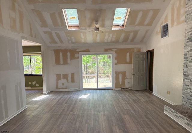 205 Country Ln, Galloway Township, NJ 08205 - unfurnished living room featuring a skylight, high vaulted ceiling, ceiling fan, wood finished floors, and baseboards