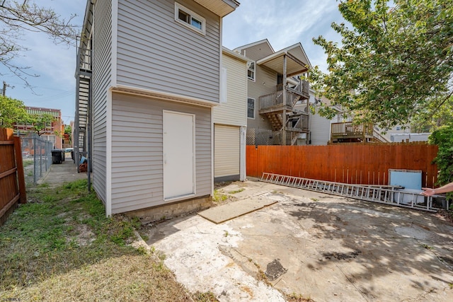32 N Florida Ave, Atlantic City, NJ 08401 - rear view of property featuring a fenced backyard and a patio