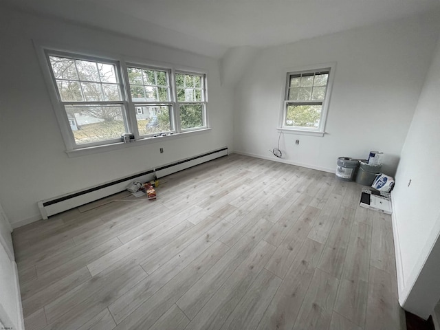 27 E Pierson Ave, Somers Point, NJ 08244 - empty room with a baseboard radiator, wood finished floors, and baseboards