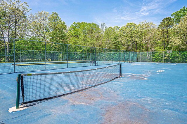 277 Mattix Run Unit 277, Galloway Township, NJ 08205 - view of tennis court with fence