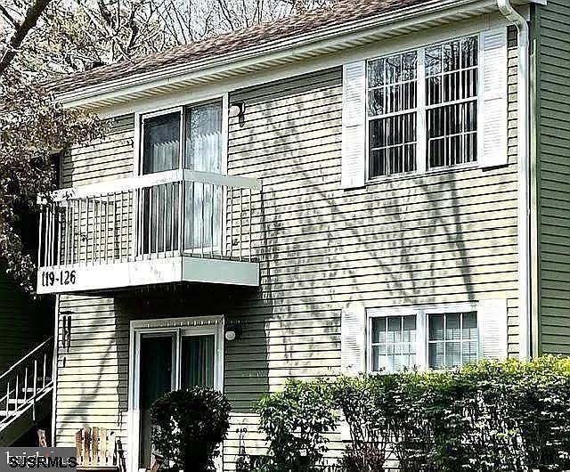 126 Club Pl Unit 126, Galloway Township, NJ 08205 - view of side of home featuring a balcony