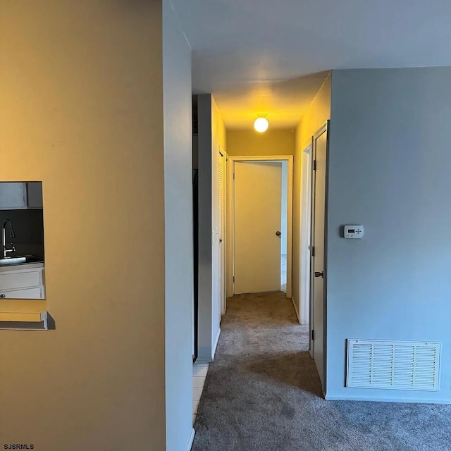 126 Club Pl Unit 126, Galloway Township, NJ 08205 - hall featuring carpet flooring and a sink