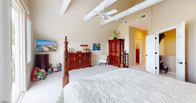 bedroom featuring carpet, high vaulted ceiling, and beam ceiling