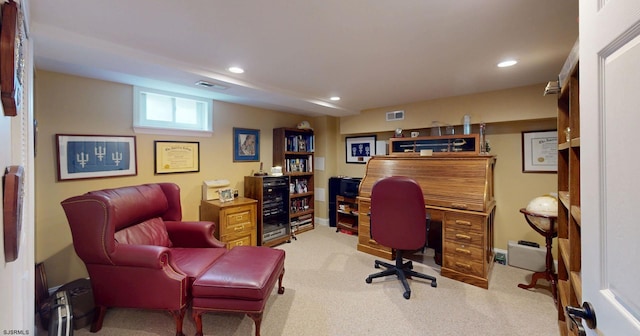 carpeted office featuring recessed lighting and baseboards