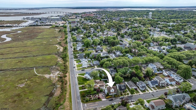 view of property location featuring nearby suburban area and a nearby body of water