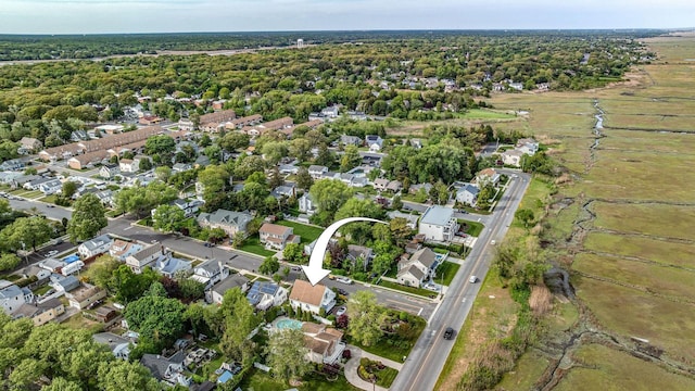 aerial overview of property's location with nearby suburban area