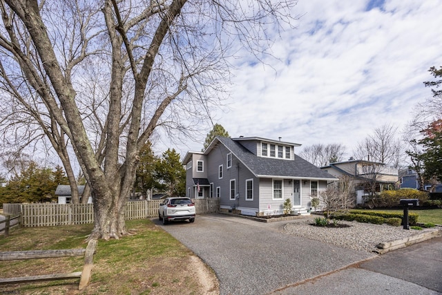 2109 W Ave, Linwood, NJ 08221 - view of front of property with driveway, a shingled roof, and fence
