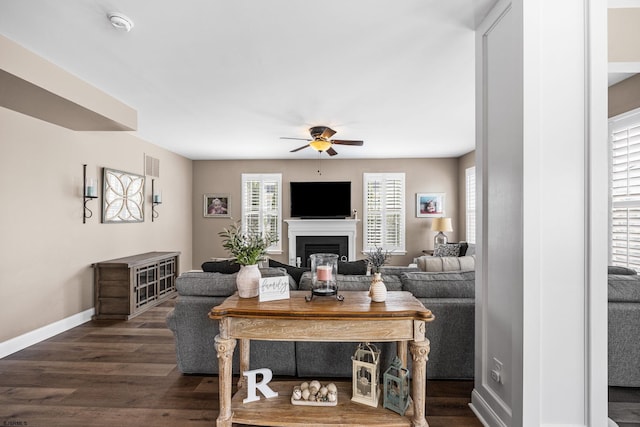 109 Briarcliff Dr, Egg Harbor Township, NJ 08234 - living area with a ceiling fan, dark wood-style flooring, baseboards, and a fireplace