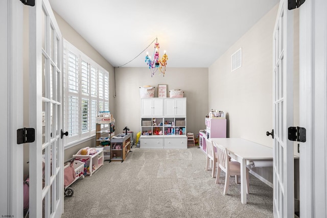 109 Briarcliff Dr, Egg Harbor Township, NJ 08234 - rec room with french doors and carpet flooring