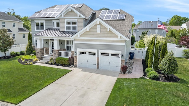 109 Briarcliff Dr, Egg Harbor Township, NJ 08234 - craftsman house with a porch, concrete driveway, a standing seam roof, roof mounted solar panels, and stone siding