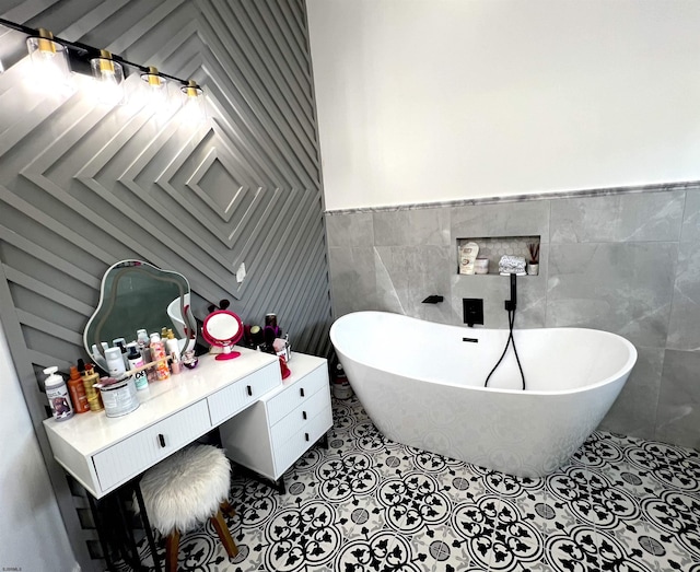 11 Gallant Fox Ln, Egg Harbor Township, NJ 08234 - bathroom featuring a freestanding tub, tile walls, wainscoting, and tile patterned floors