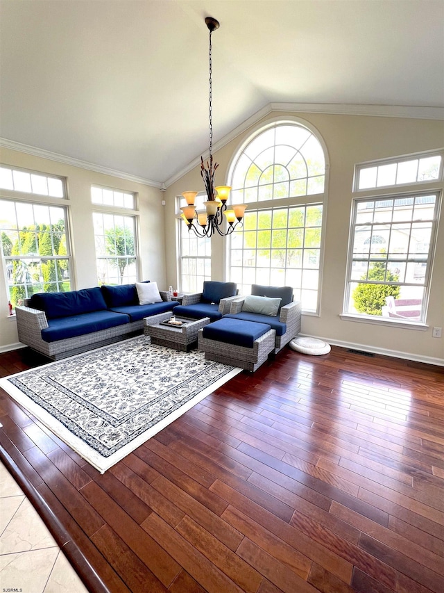 11 Gallant Fox Ln, Egg Harbor Township, NJ 08234 - living area with vaulted ceiling, a chandelier, wood finished floors, ornamental molding, and baseboards