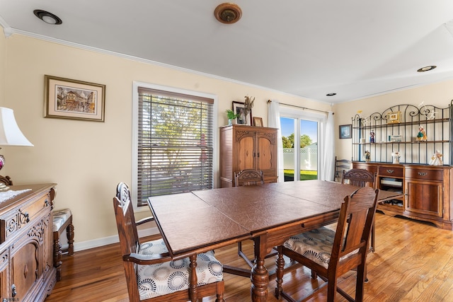 4400 Harbor Beach Blvd, Brigantine, NJ 08203 - dining space with crown molding, light wood-style floors, baseboards, and recessed lighting