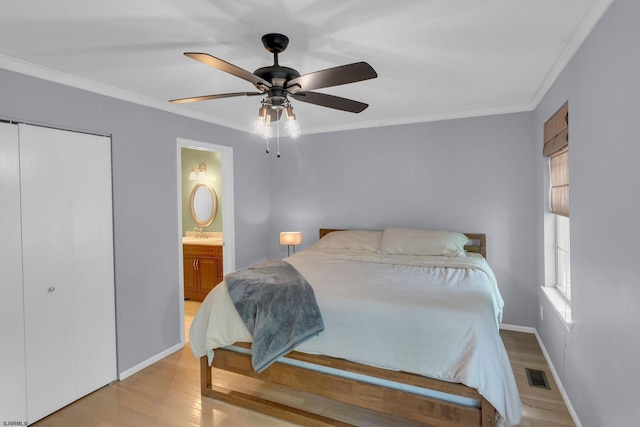 4768 Summersweet Dr Unit 4768, Mays Landing, NJ 08330 - bedroom with ornamental molding, wood finished floors, baseboards, a closet, and connected bathroom