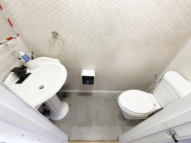 15 N Marion Ave, Ventnor, NJ 08406 - bathroom featuring wood finished floors, toilet, and a sink