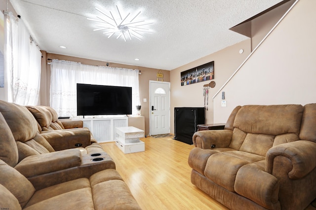 15 N Marion Ave, Ventnor, NJ 08406 - living room featuring light wood-style floors, a textured ceiling, and recessed lighting