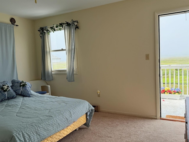 4102 W Ave Unit 2, Ocean City, NJ 08226 - bedroom with multiple windows, carpet flooring, and baseboards