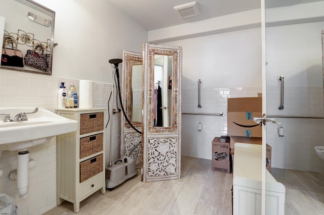 9315 Ventnor Ave, Margate, NJ 08402 - full bathroom with tile walls and a wainscoted wall