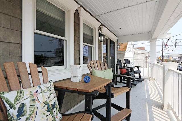 9315 Ventnor Ave, Margate, NJ 08402 - balcony featuring a porch