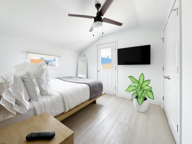 9315 Ventnor Ave, Margate, NJ 08402 - bedroom with vaulted ceiling, light wood-style flooring, a ceiling fan, and baseboards