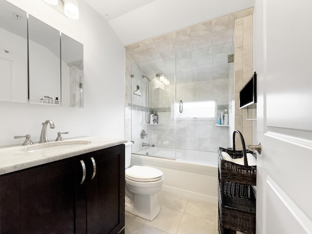 9315 Ventnor Ave, Margate, NJ 08402 - full bath with tile patterned flooring, combined bath / shower with glass door, toilet, vanity, and vaulted ceiling