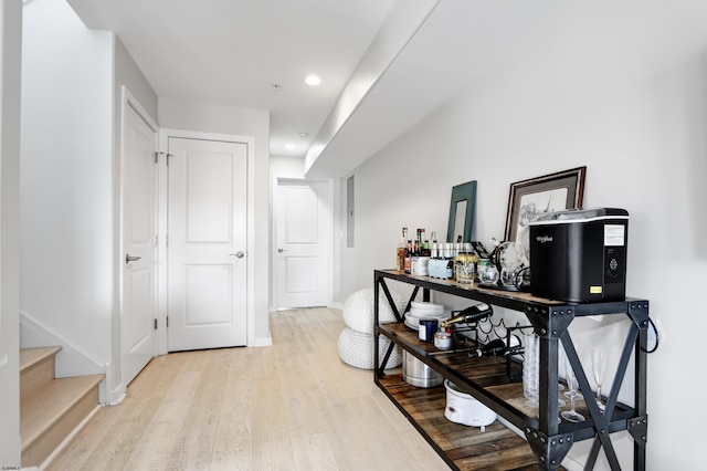 9315 Ventnor Ave, Margate, NJ 08402 - corridor with light wood-style floors, stairway, recessed lighting, and baseboards