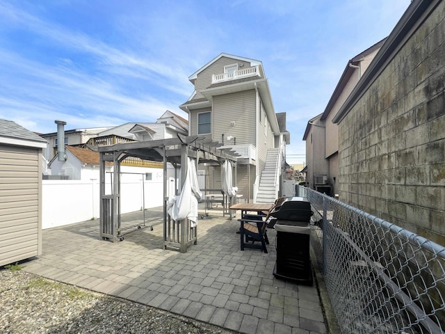 9315 Ventnor Ave, Margate, NJ 08402 - view of patio featuring a pergola and a fenced backyard