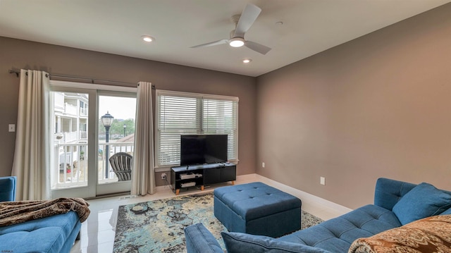 tiled living area with ceiling fan, recessed lighting, and baseboards