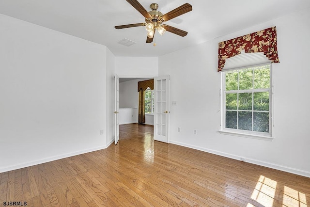 317 Southmoor Dr, Galloway Township, NJ 08205 - empty room with ceiling fan, plenty of natural light, and light wood-style flooring
